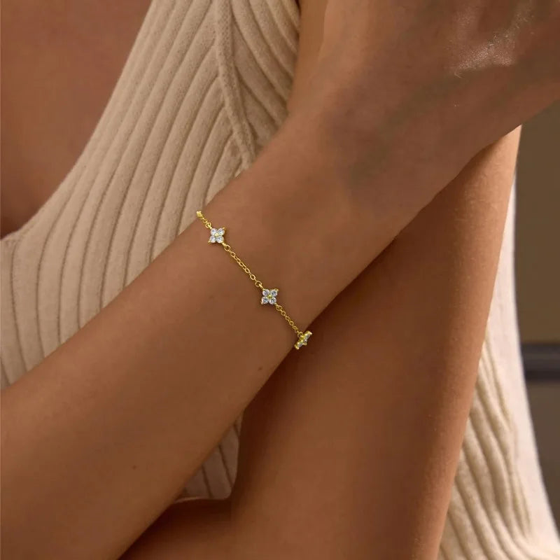 Lucky Bloom Bracelet – Silver & Gold Four-Leaf Flower CZ Chain