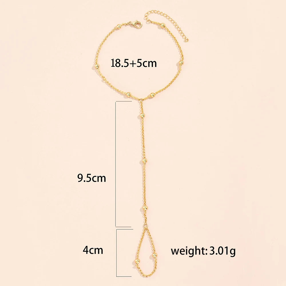 Golden Glow Hand Harness – Delicate Beaded Finger Bracelet for Women