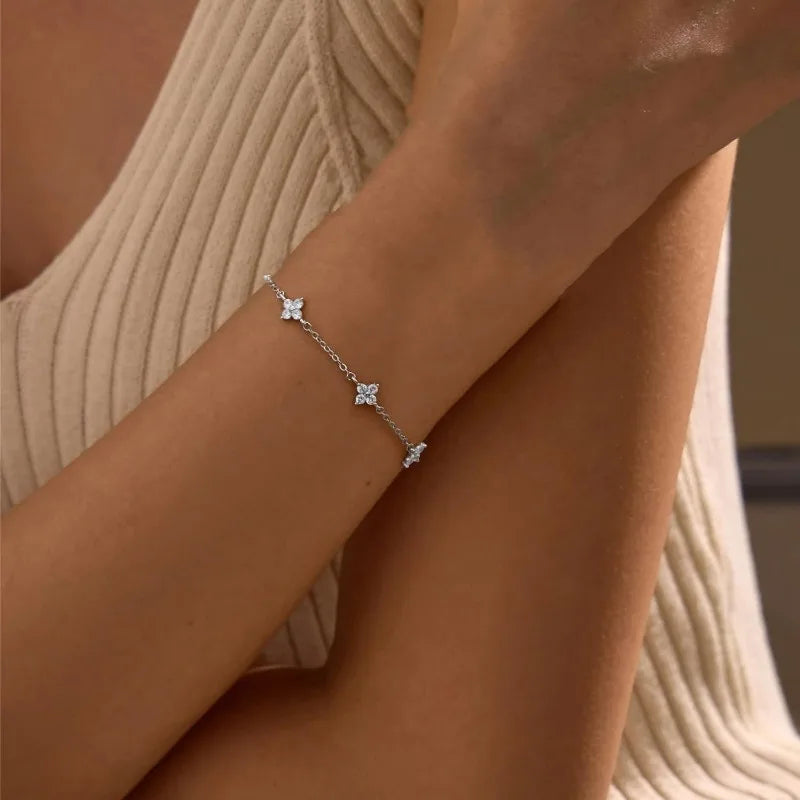 Lucky Bloom Bracelet – Silver & Gold Four-Leaf Flower CZ Chain