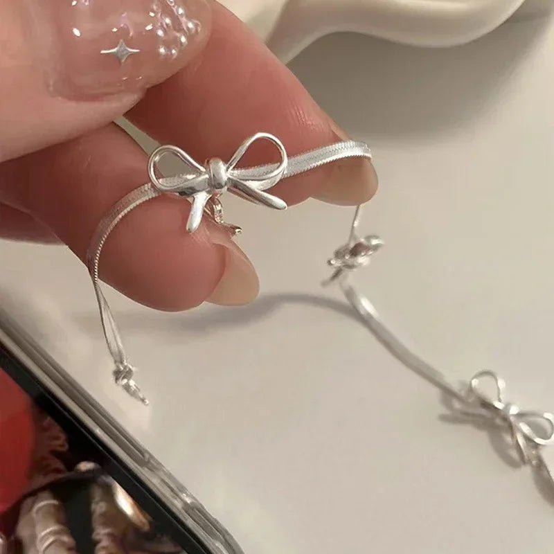 Sparkle Bow Charm Bracelet – Elegant Ribbon Chain for Women