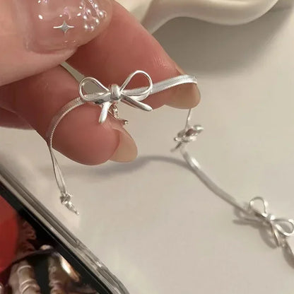 Sparkle Bow Charm Bracelet – Elegant Ribbon Chain for Women