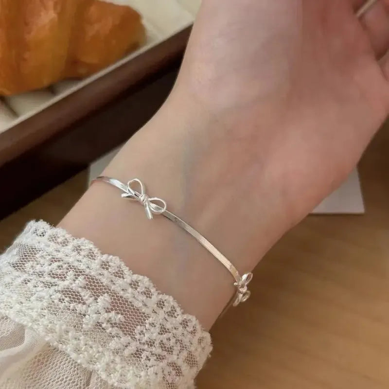 Sparkle Bow Charm Bracelet – Elegant Ribbon Chain for Women