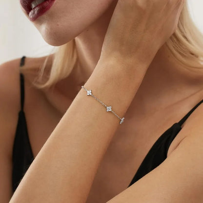 Lucky Bloom Bracelet – Silver & Gold Four-Leaf Flower CZ Chain