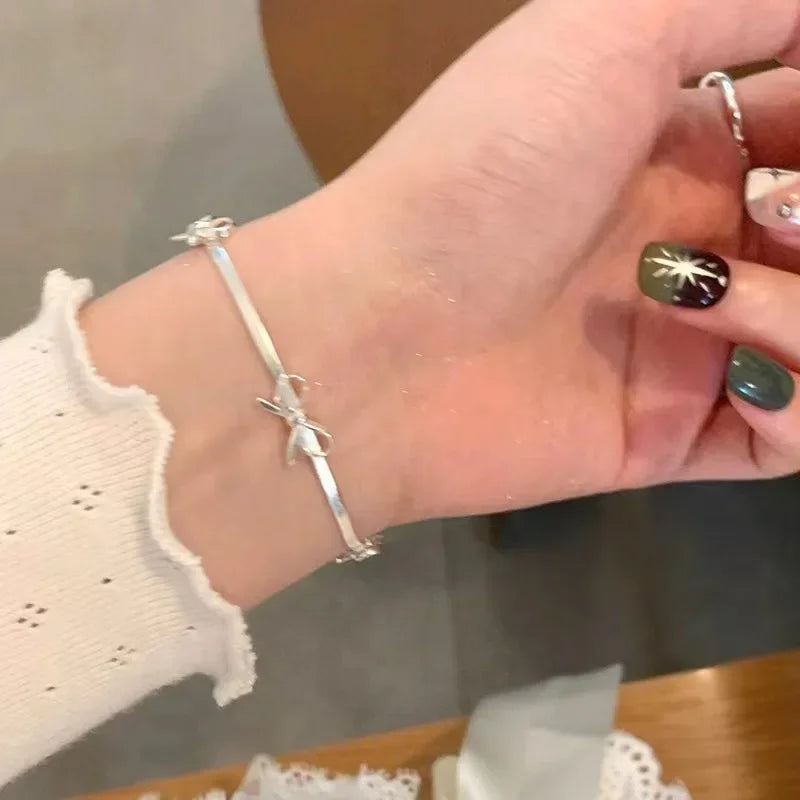 Sparkle Bow Charm Bracelet – Elegant Ribbon Chain for Women
