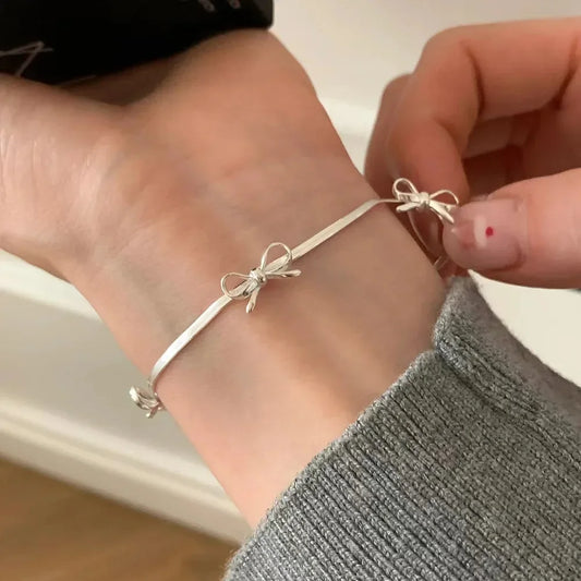 Sparkle Bow Charm Bracelet – Elegant Ribbon Chain for Women