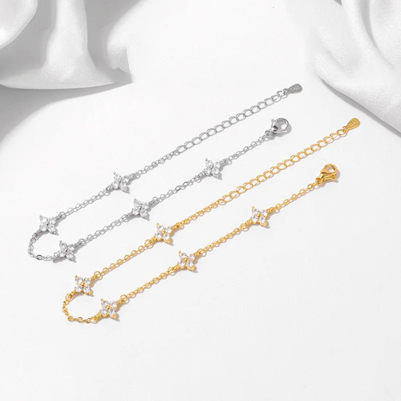 Lucky Bloom Bracelet – Silver & Gold Four-Leaf Flower CZ Chain