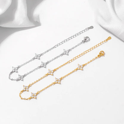 Lucky Bloom Bracelet – Silver & Gold Four-Leaf Flower CZ Chain