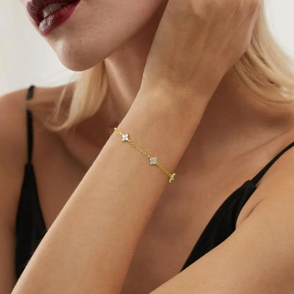 Lucky Bloom Bracelet – Silver & Gold Four-Leaf Flower CZ Chain